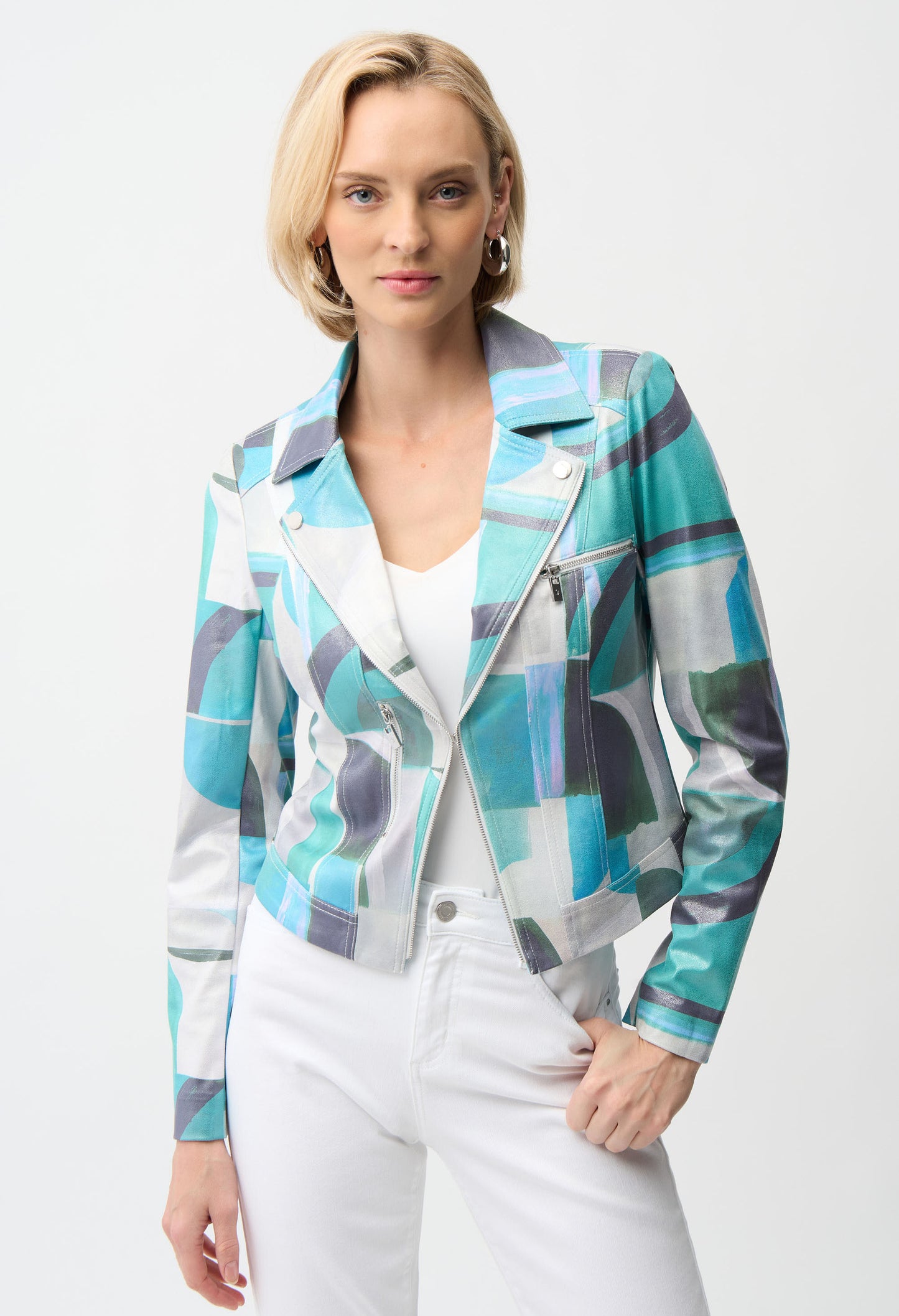 Woman wearing a colorful patterned blazer on a white background