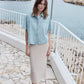 woman wearing a crochet long pencil skirt