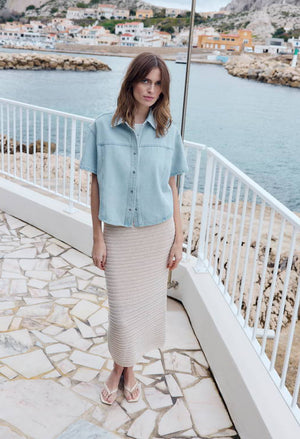 woman wearing a crochet long pencil skirt