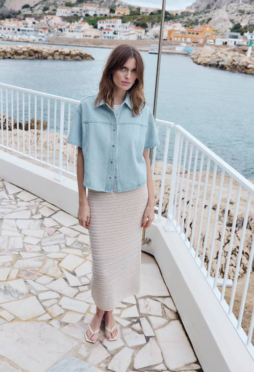 woman wearing a crochet long pencil skirt