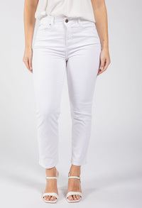 Person wearing white jeans on a plain background
