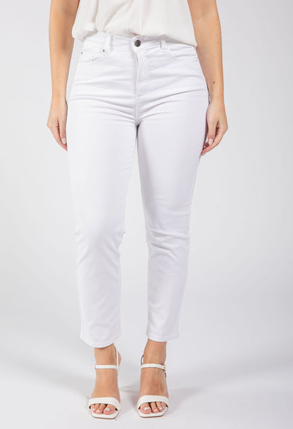Person wearing white jeans on a plain background