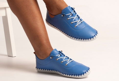 bright blue flat plimsol shoes