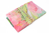 rose printed scarf with tassel ends in pink