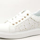 white platform trainer with daisy design