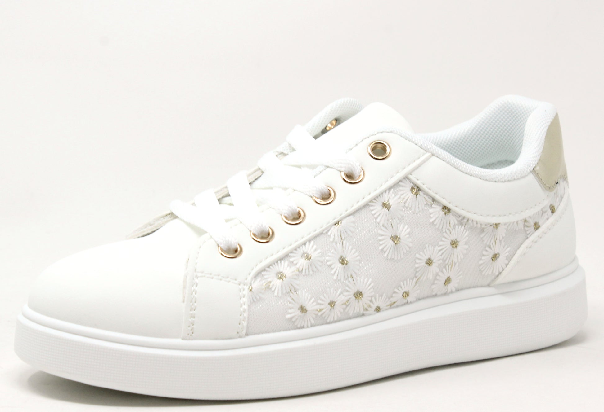 white platform trainer with daisy design