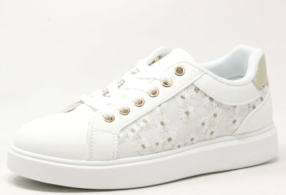 white platform trainer with daisy design