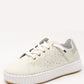 White sneaker with a gray sole on a white background