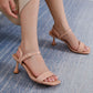 Low heel with a slim heel and adjustable ankle strap