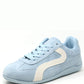 Light blue sneaker with a white stripe on a white background