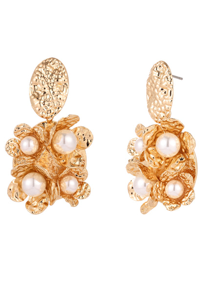Gold earrings with pearl-like stones on a white background