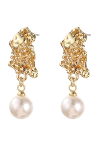 Gold earrings with pearl drops on a white background