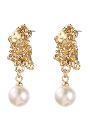 Gold earrings with pearl drops on a white background
