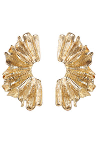 Gold leaf-shaped earrings on a white background