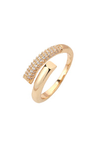 Gold ring with diamond accents on a white background