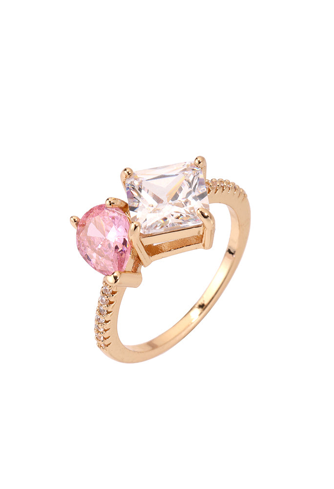 Rose gold ring with pink and clear gemstones on a white background