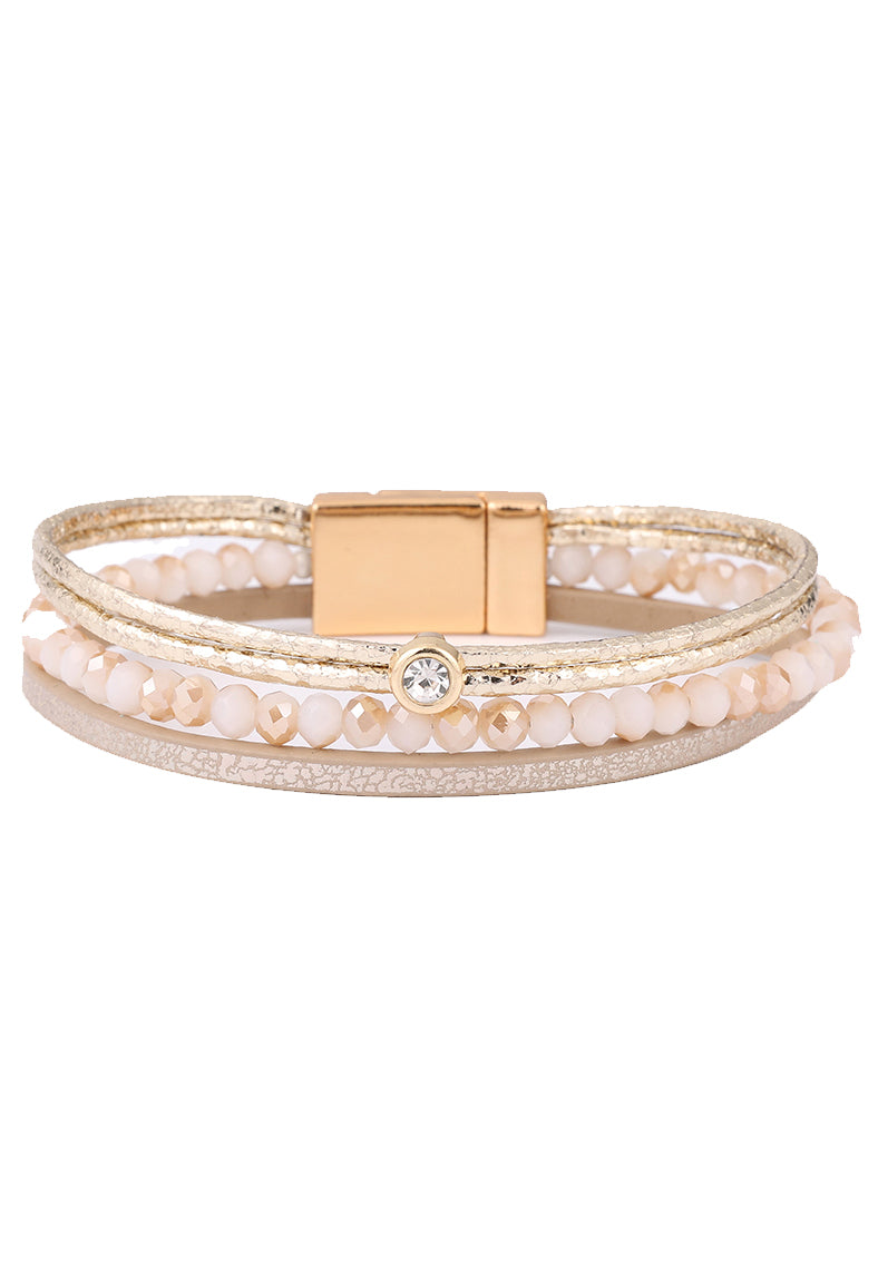 Multistrand bracelet with a gold clasp on a white background