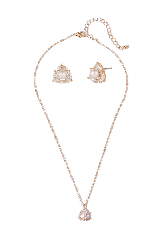 Rose gold necklace and earrings set on a white background