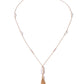 Necklace with tassel on a white background