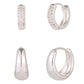 Set of silver hoop earrings on a white background
