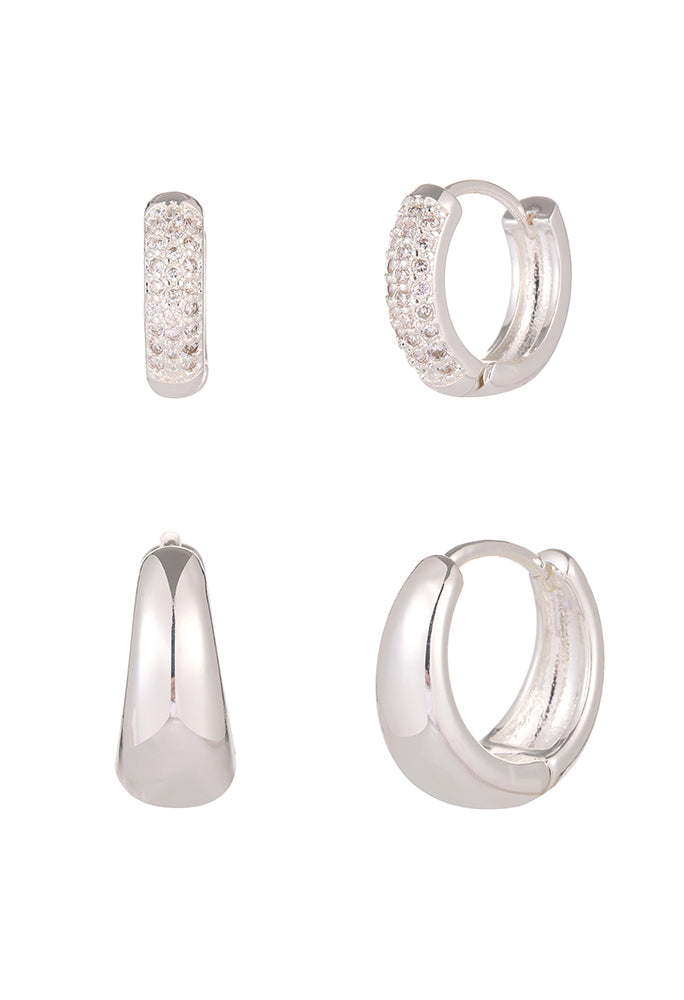 Set of silver hoop earrings on a white background