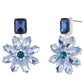 Pair of blue flower-shaped earrings with gemstones on a white background