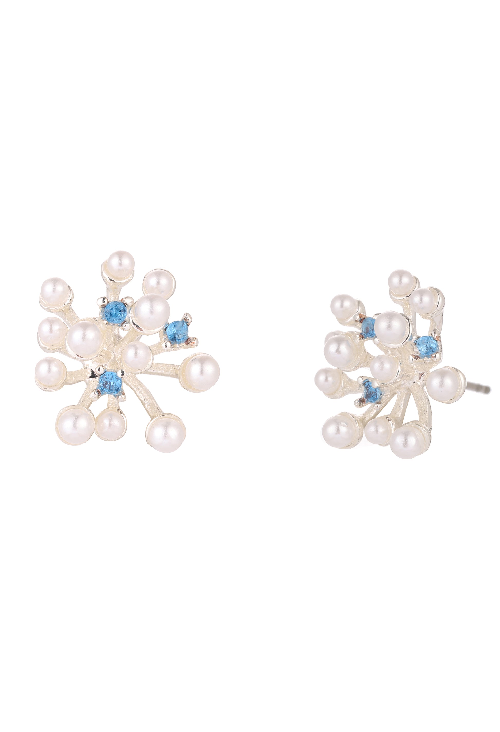 Pair of pearl earrings with blue gemstones on a white background