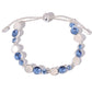 Bracelet with blue and silver beads on a white background