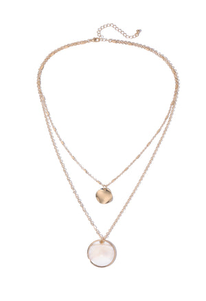 Necklace with two pendants on a white background