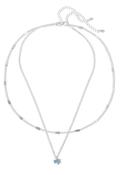 Necklace with a blue pendant on a white background