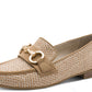 Beige loafer shoe with woven pattern on a white background
