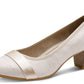 White shoe with a wooden heel on a white background