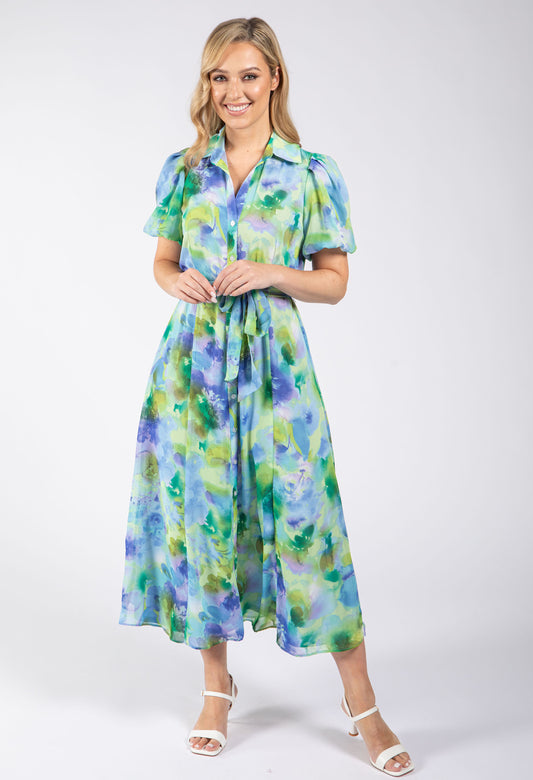 Woman wearing a floral dress on a white background