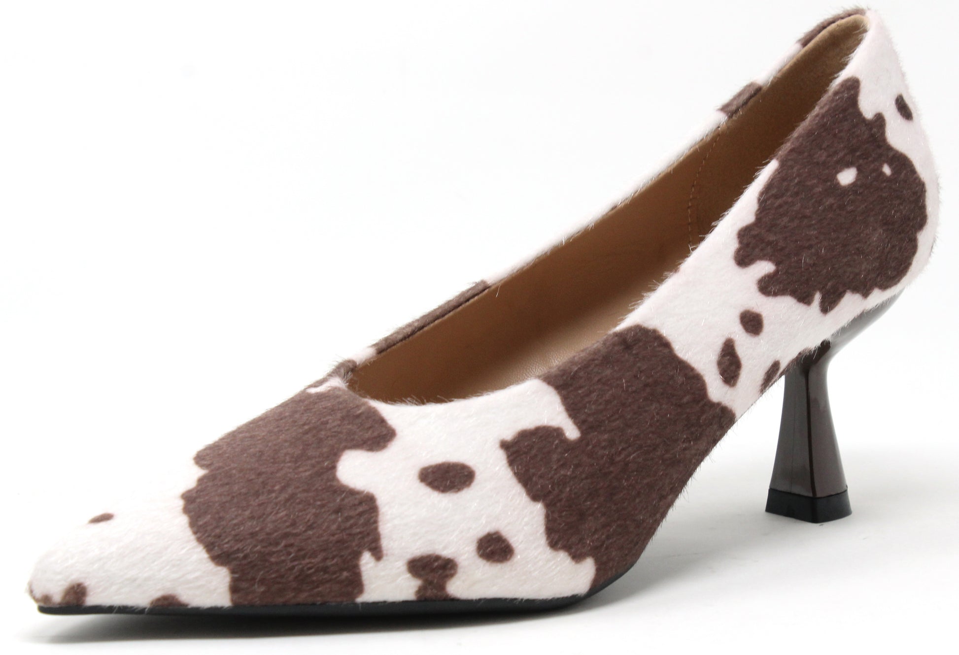 High-heeled shoe with brown and white cow print pattern on a white background