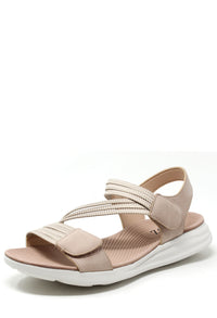 Beige sandal with white sole on a white background