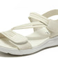 White sandal with multiple straps on a white background
