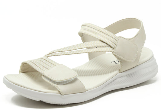 White sandal with multiple straps on a white background