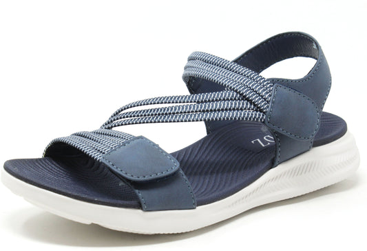 White sandal with multiple straps on a white background