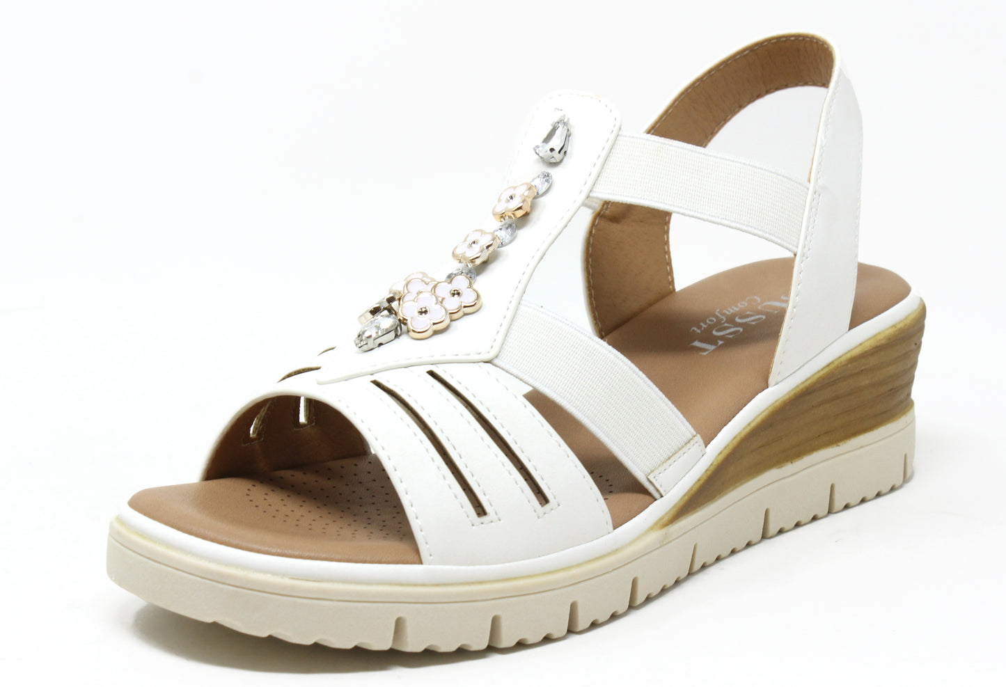 White sandal with decorative straps on a white background