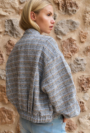 Short bouclé jacket with elasticated cuffs and hem