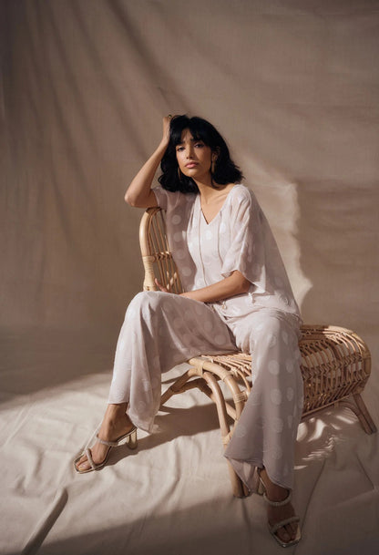 woman wearing polka dot trousers