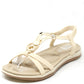 Beige sandal with clear sole on a white background