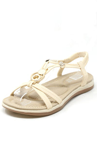 Beige sandal with clear sole on a white background