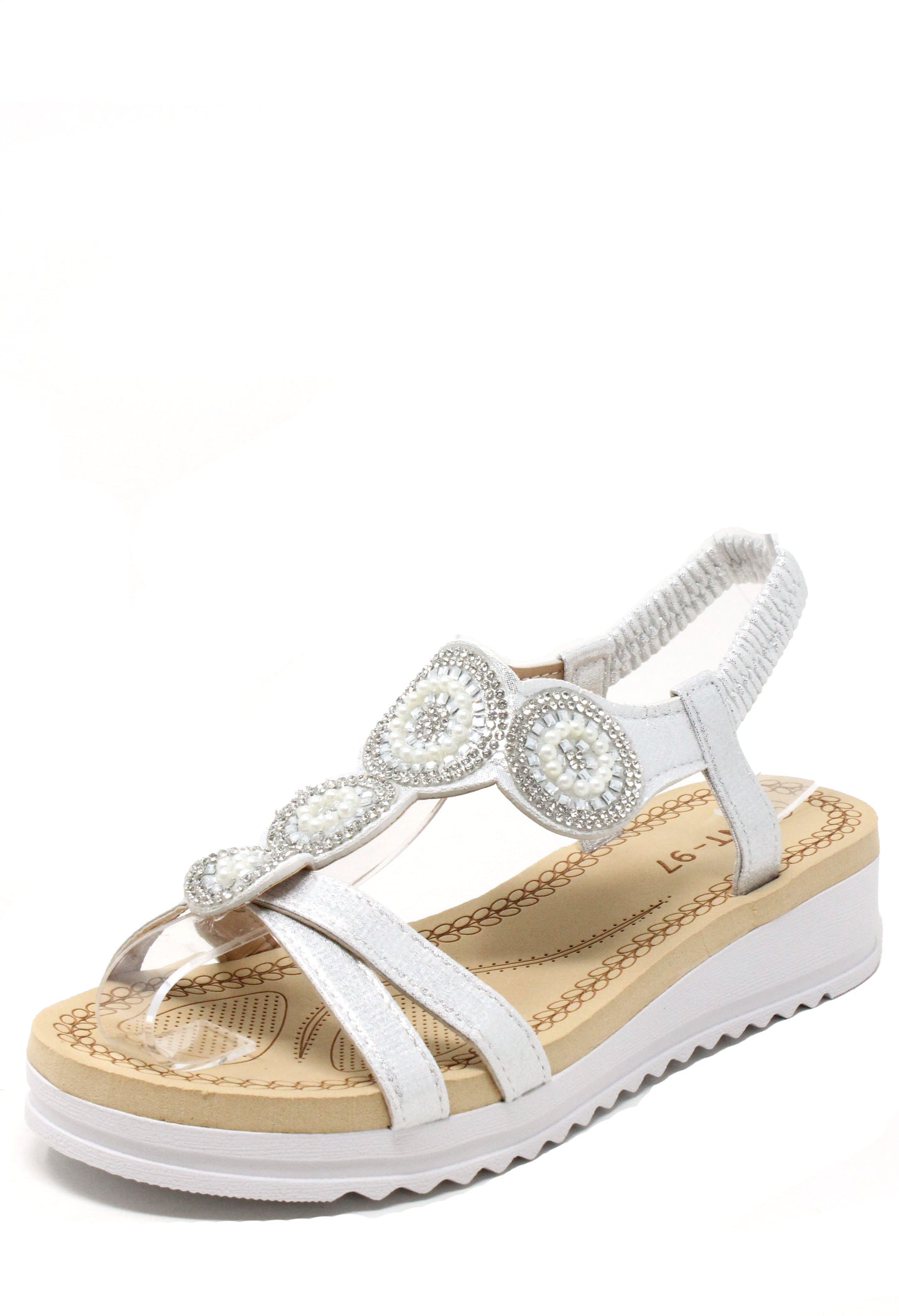 White sandal with decorative straps on a white background