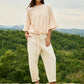 High waist barrel trousers with button detail