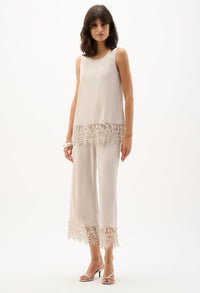 Chic Top with Embroidered Hem