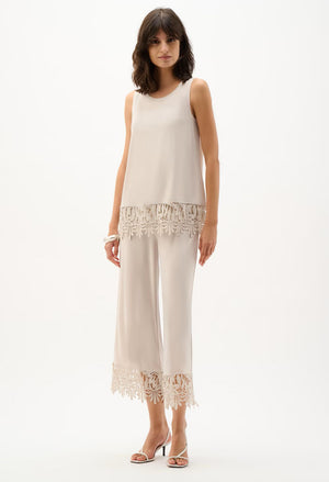 Chic Top with Embroidered Hem