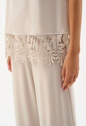 Chic Top with Embroidered Hem