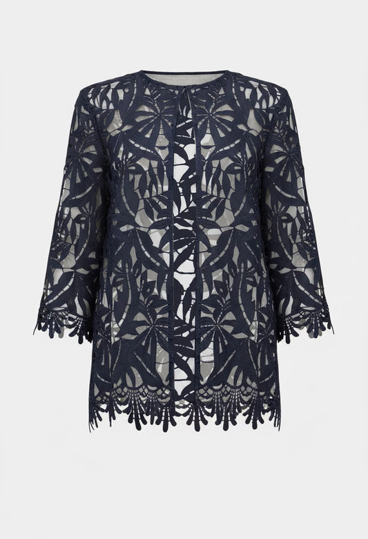 Navy lace dress with intricate patterns on a white background
