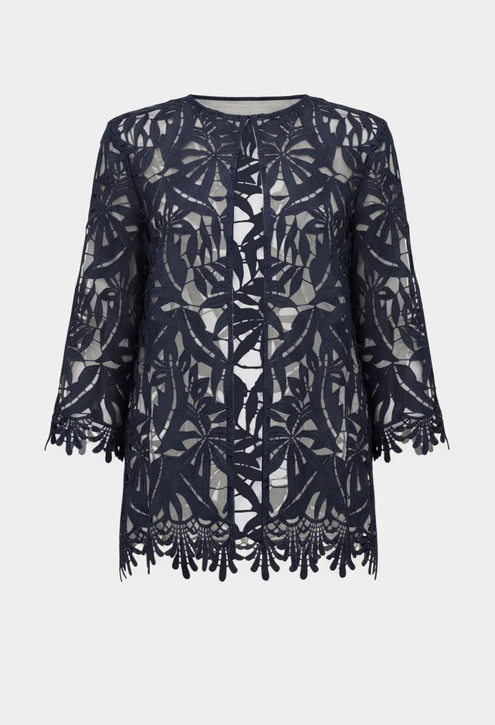 Navy lace dress with intricate patterns on a white background